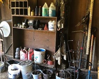 weed trimmer, wooden crates, bench grinder