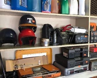 baseball helmets, power tools in cases, automotive supplies, battery charger