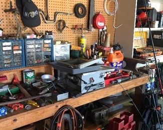 booster cables, tile cutter, framing squares, lug wrench, anvil