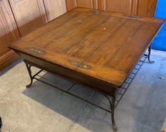 Coffee table (wood and iron) with storage capabilities, has two matching end tables