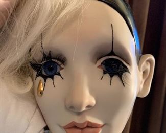Porcelain dolls and many miscellaneous doll parts