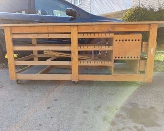Custom build wood working bench on castors with slots for clamps and more! - Front View