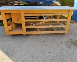 Custom build wood working bench on castors with slots for clamps and more! - Back View