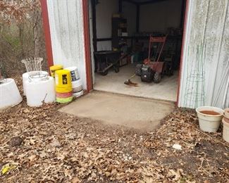 small shed with gardening items