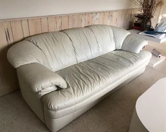 White leather-like pair of sofas. 82”L x 30”H x 32”D. Buy them now, $300 for both.