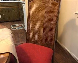 2 arm and 4 cane back side chairs