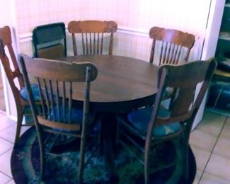 Antique Table with 5 chairs. 