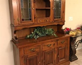 Gorgeous custom built hutch matches the octagon pedestal table. Stained glass windows are beautiful when inside lights are on. This piece is a large, heavy statement-maker, for sure!! $300                                             The table, chairs and hutch together are $600.