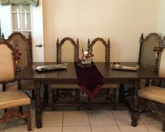 Gorgeous solid wood elegant farmhouse-style table and 6 chairs. Must see the wood grain to appreciate! The 7 pieces together are priced to sell at $600.