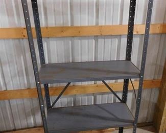 Blue metal storage rack with 4 shelves 61in H X 30 1/2in W X 12in D