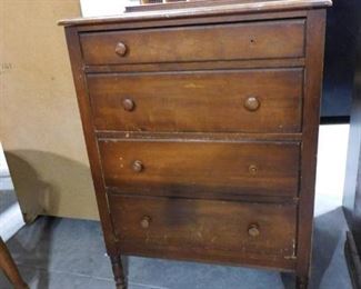 4 drawer brown chest of drawers 43 1/2in H X 30in W X 18in D (needs handles)