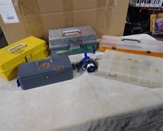 lot of fishing supplies including fish reel and 5 tackle boxes with misc. bait