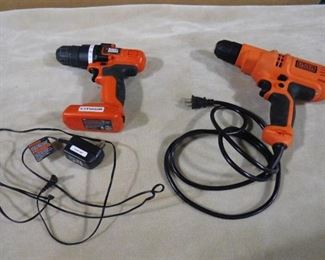 2 Black & Decker power drills one with cord other with charger