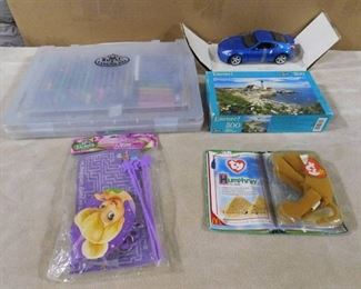lot of misc. children's toys including colored pencil set, puzzle, toy car and beanie baby