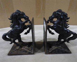 2 horse cast iron book holder statues