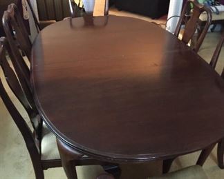 Dining room table with matching chairs.