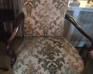 Upholstered armchair.