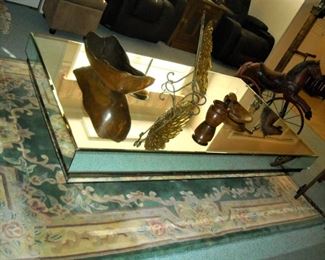 Oversized glass topped contemporary coffee table.  