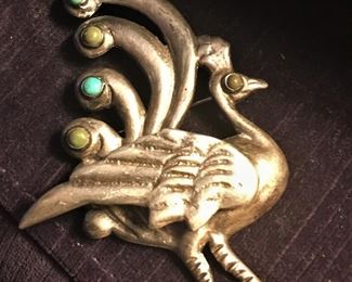 Hand wrought sterling bird pin with gems $125