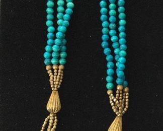 Turquoise colored wooden and brass neclace $60