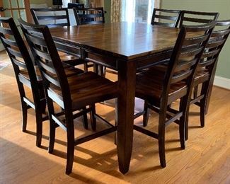 Abaco Solid Acacia Hardwood Counter Table w/ 18-Inch Butterfly Leaf by Steve Silver Co.
Abaco Solid Acacia Hardwood Counter Height Chairs by Steve Silver Co. 
