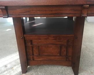This Dining room table is impressive!  Beautiful hardwood with leaves and under storage.  With 4 chairs priced to sell at $250