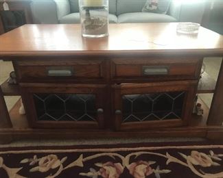 Love, Love this coffee table with storage and glass.  Top raises upward and out for dining.   Priced to sell