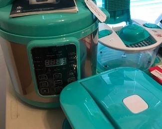 Teal Lovers.  All these items are NEW!  New pressure cookers, choppers all priced for a 1/3 of new