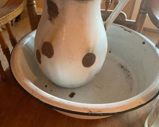 Old metal pitcher and wash basin