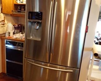 2 year old refrigerator, stainless steel