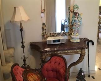 Vintage Tole Mirror $395, Antique Marble Top Console Table $1,250, Ceramic Chinese Figure Made In Italy $95