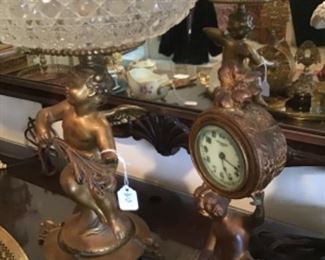 Spelter Cherubs as a footed bowl and table top clock
