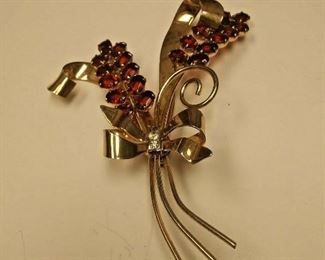 https://www.ebay.com/itm/114272366197	AB0375 USED VINTAGE 9.25 STERLING SILVER FLOWER BROOCH WITH RED & WHITE RHINEST		 Buy-it-Now 	 $20.00 
