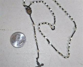 https://www.ebay.com/itm/123960392984	LAN0606 VINTAGE CATHOLIC 800 SILVER ROSARY WITH MOTHER OF PEARL BEADS USED NOTE P		 Buy-It-Now 	 $19.95 
