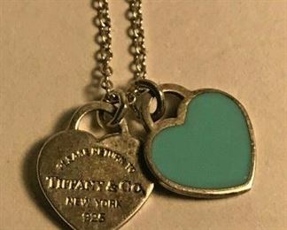 https://www.ebay.com/itm/114426953566	WL136 BLUE HEART MINI DOUBLE HEART LOCK NECKLACE STERLING SILVER TIFFANY & CO 		 Buy-it-Now 	 $125.00 
