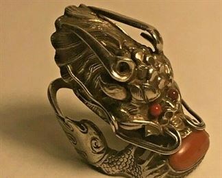 https://www.ebay.com/itm/124426450275	WL141 VINTAGE UNMARKED STERLING SILVER DRAGON RING WITH RED STONE		 Buy-it-Now 	 $200.00 
