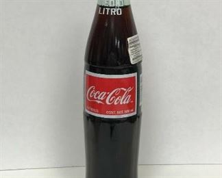 https://www.ebay.com/itm/124351405663	WL152 COCA-COLA BOTTLE 2002 FROM MEXICO 500ML		 Buy-it-Now 	 $20.00 
