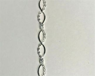 
https://www.ebay.com/itm/124426453353	WL169 STERLING SILVER AND CUBIC ZIRCONIA BRACELET WITH BOX CLASP 		 Buy-it-Now 	 $20.00 

