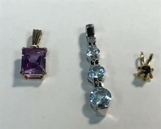 https://www.ebay.com/itm/114477619345 WL205 LOT OF 3 PENDANTS WITH 3 REAL GEMS Buy-it-Now $40.00
