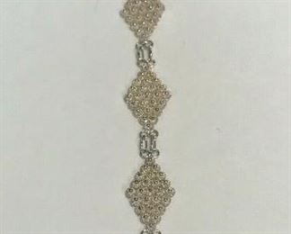 https://www.ebay.com/itm/114501912175	WL168 STERLING SILVER DIAMOND PATTERN BRACELET WITH LOBSTER CLASP 		 Buy-it-Now 	 $20.00 
