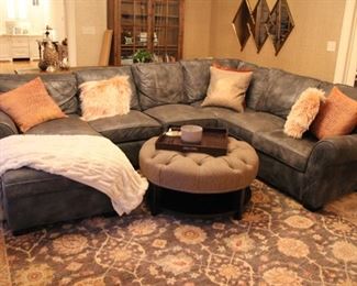 Arhaus leather sectional sofa & round tufted ottoman