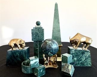 $100 for the Collection of green marble and brass office decor. Pyramid measures 5x5x16. Small cubes measure 1.5x1.5. Large ball and stand measure, 4” in diameter and 7” tall. Small round dish has a 3” diameter. Brass bear with stand measures 5x2.5x7.5. Brass bull with stand measures 6x3x8.5.