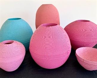 Beautiful, designer vases from Flute of Chicago. These are crafted using corrugated cardboard. $100/each. $50 for the small bowl. From right to left starting in the back the measurements are: 13” high with a 12” diameter, 17” high with a 10” diameter, 11 high with a 11” diameter, 9” high with an 8” diameter, 12” high with a 11” diameter and 5” high with a 7” diameter. 