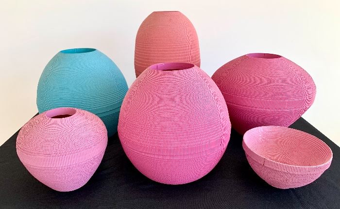 Beautiful, designer vases from Flute of Chicago. These are crafted using corrugated cardboard. $100/each. $50 for the small bowl. From right to left starting in the back the measurements are: 13” high with a 12” diameter, 17” high with a 10” diameter, 11 high with a 11” diameter, 9” high with an 8” diameter, 12” high with a 11” diameter and 5” high with a 7” diameter. 