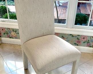 $500 for the SET of 8 Custom upholstered dining chairs. Chairs are off-white with small flecks of light blue, pink and purple. Great condition!