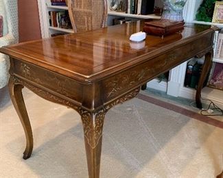 $400. One of 2020's items of the year! Solid wood writing desk by Drexel Heritage. Hand painted detail in the Chinoiserie genre. Desk measures 59x27x30. Perfectly scaled for smaller spaces.