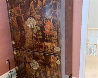 $650. Hand painted, Chinoiserie Cabinet with brass hardware. Cabinet measures 40Lx21Wx71H. Excellent condition. Both top and bottom door open with a bi-fold.