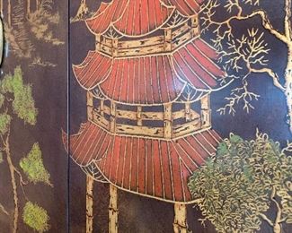 Close up picture of hand painted detail on Chinoiserie Cabinet.