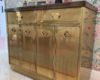 $400. Vintage, Chinoiserie, brass veneer with faux wood top server. Top expands offering more surface area. Server measures 40x19x33. Great condition!