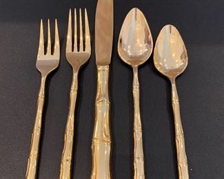 $500. Set of 155 pieces, gold colored, bamboo flatware. Yes...there are really 155 pieces!
